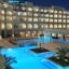 Grand Hyatt Doha hotel and pool at night default 1